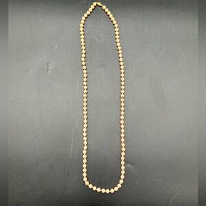 Vintage Money long faux pearl necklace